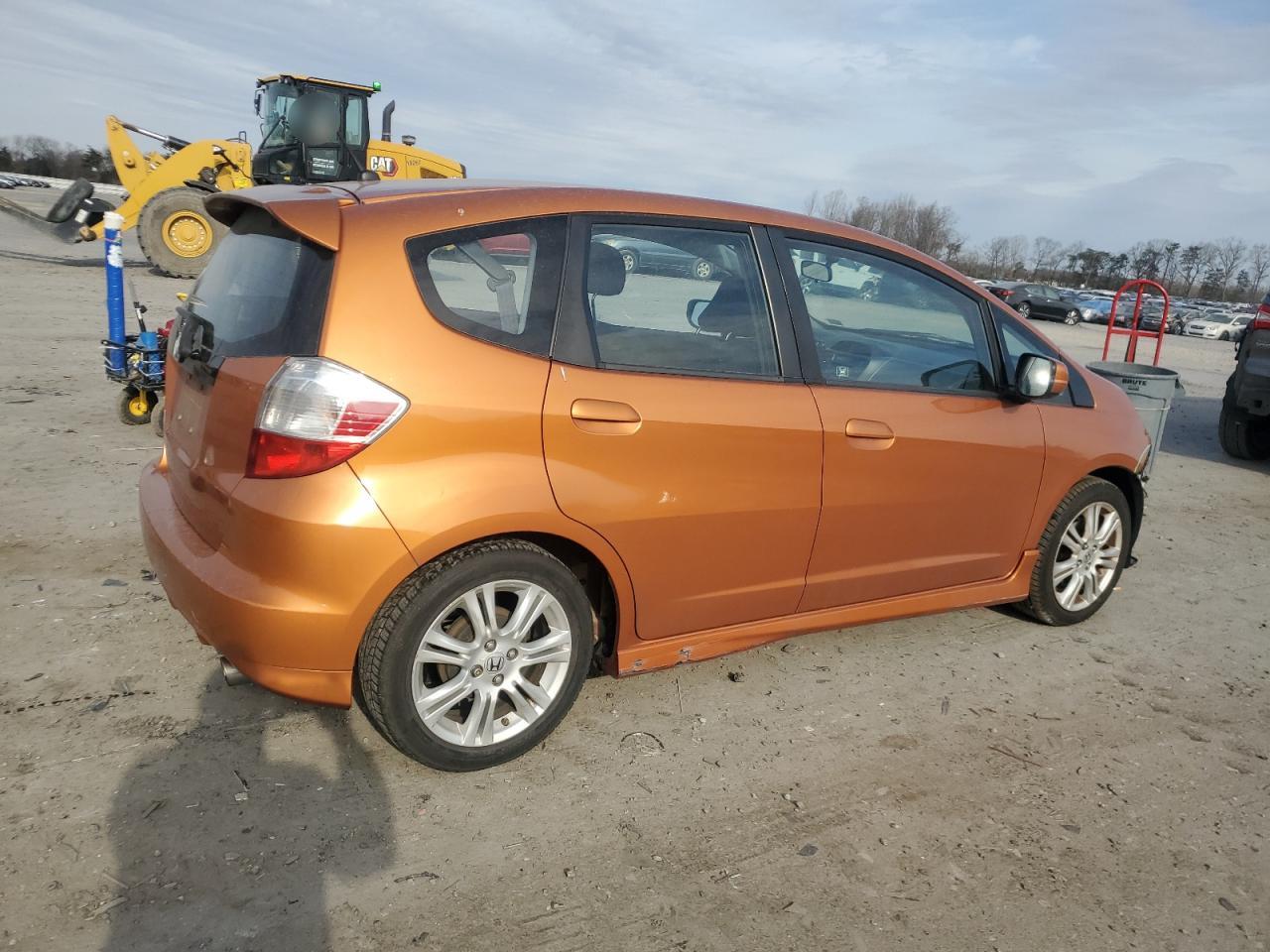 2010 Honda Fit VIN JHMGE8H41AC009679 Copart auction photo, front end / minor dent/scratches damage thumbnail 3