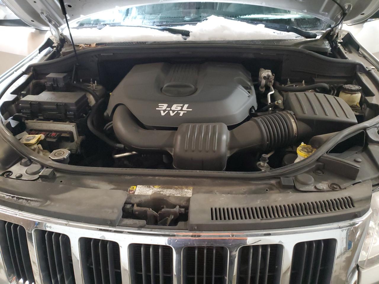 2012 Jeep Grand Cherokee VIN 1C4RJFAG4CC166429 Copart auction photo, side / minor dent/scratches damage thumbnail 12