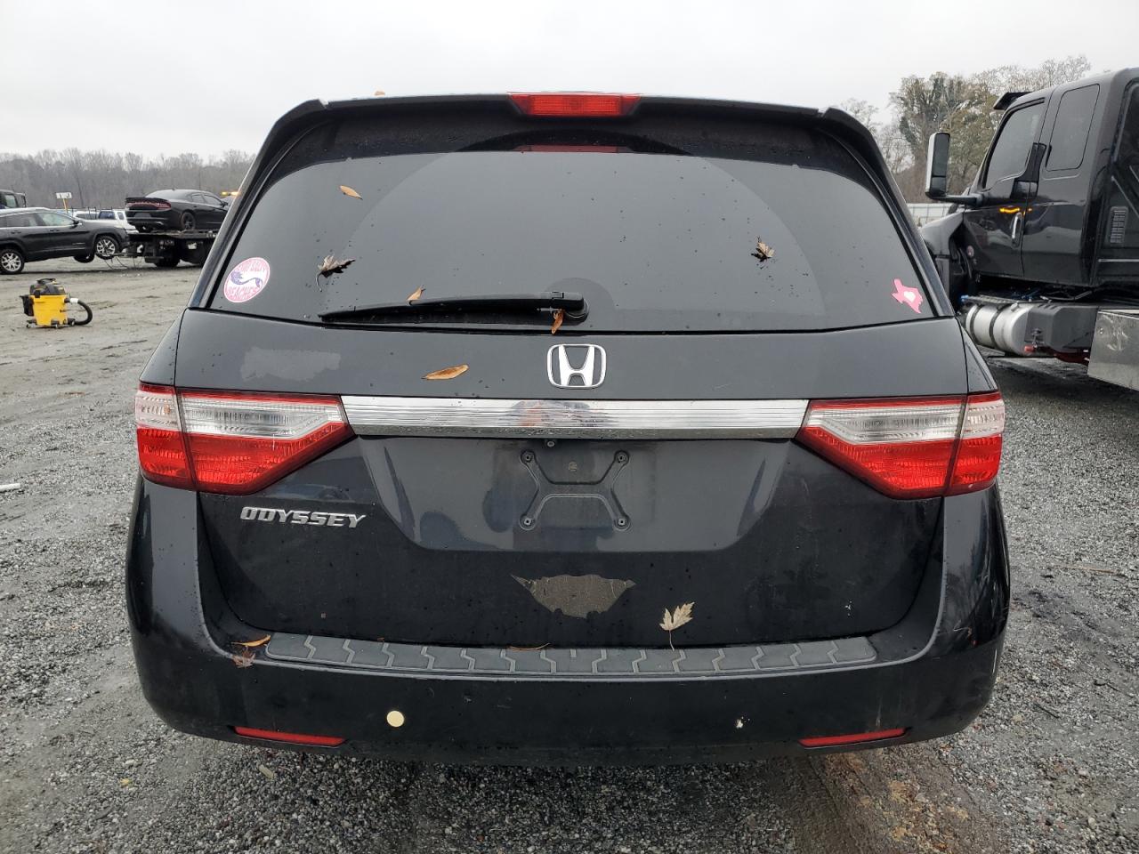 2012 Honda Odyssey VIN 5FNRL5H60CB025474 Copart auction photo, burn damage thumbnail 6