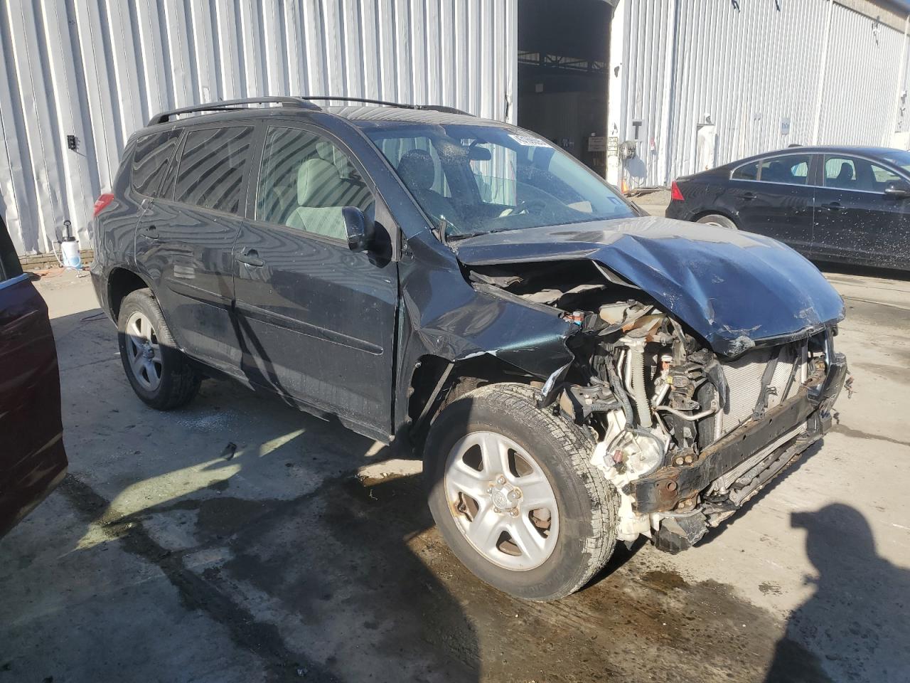 2011 Toyota RAV 4 VIN 2T3JF4DV4BW103971 Copart auction photo, front end / rear end damage thumbnail 4