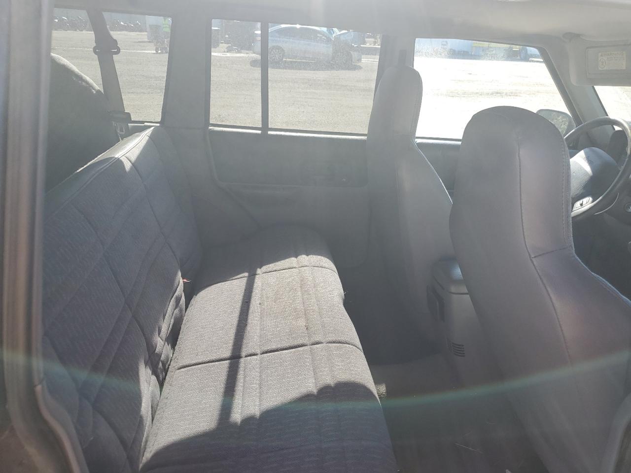 1998 Jeep Grand Cherokee VIN 1J4FT68S5WL136989 Copart auction photo, burn - engine damage thumbnail 11