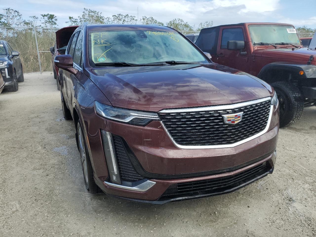 2022 Cadillac XT6 VIN 1GYKPCRS1NZ146012 Copart auction photo, water/flood damage thumbnail 5