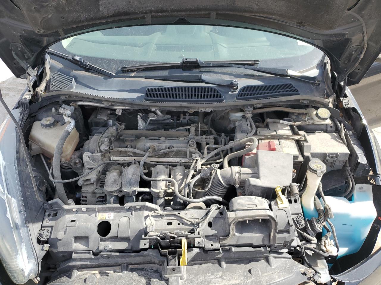 2015 Ford Fiesta VIN 3FADP4EJ4FM105822 Copart auction photo, front end / all over damage thumbnail 11