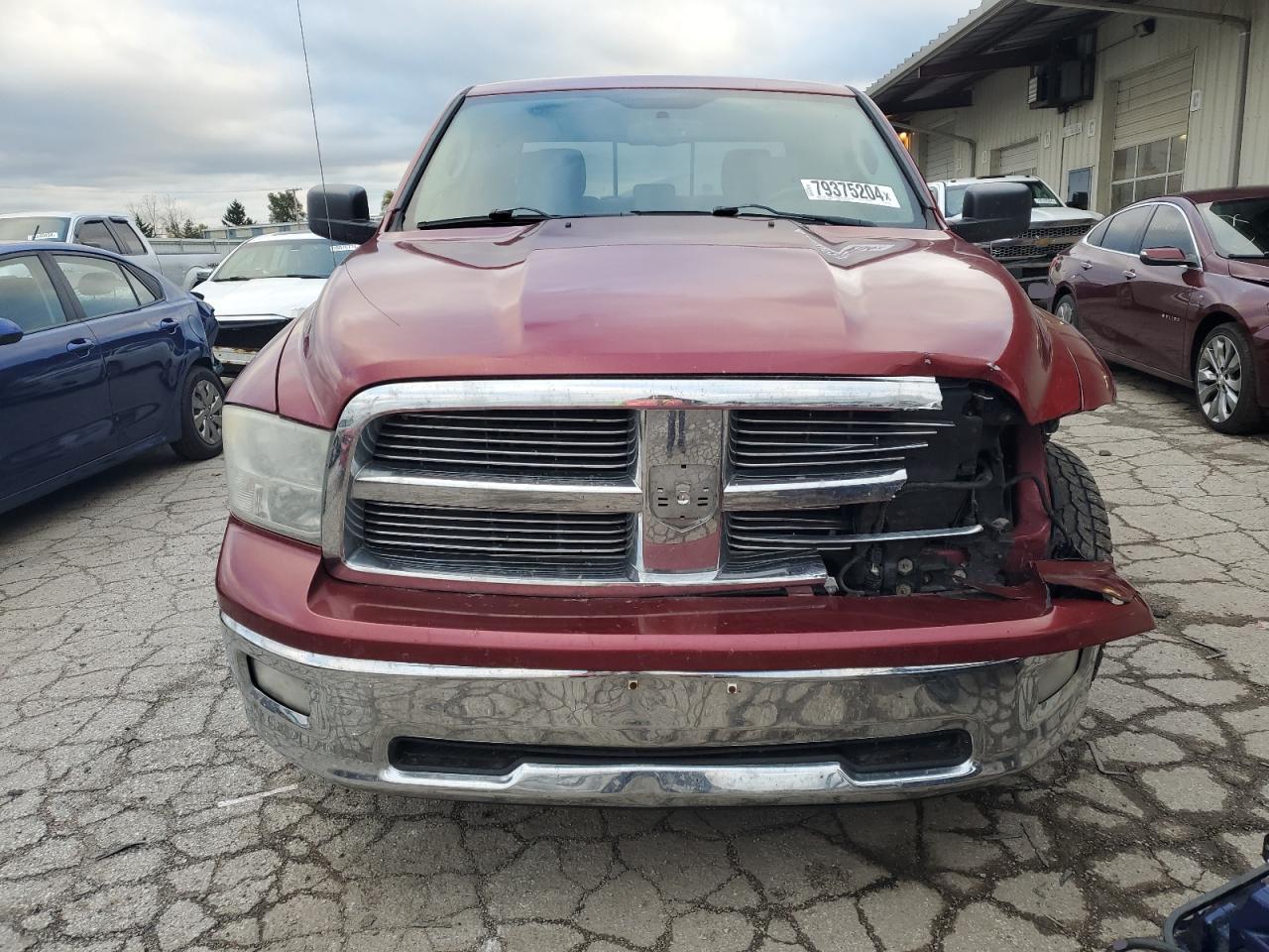 2011 Dodge RAM VIN 1D7RV1CT1BS597922 Copart auction photo, front end / side damage thumbnail 5