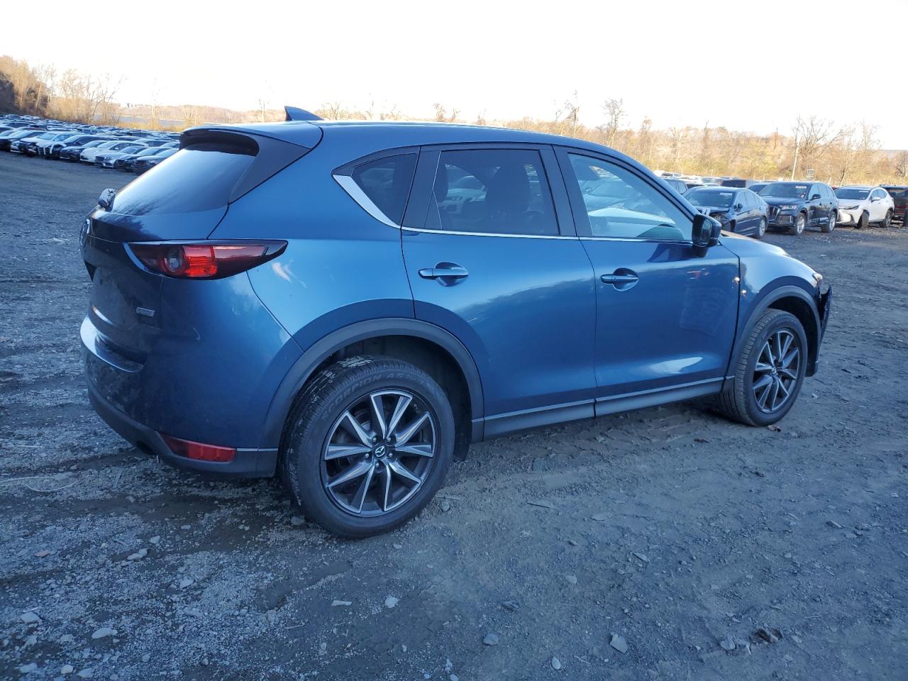 2018 Mazda CX-5 VIN JM3KFBCM3J0450882 Copart auction photo, front end / minor dent/scratches damage thumbnail 3