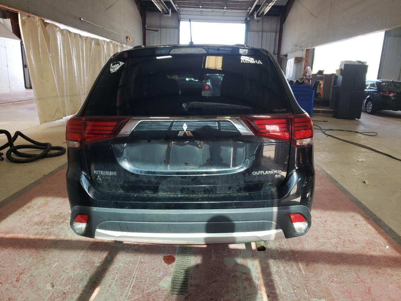 2016 Mitsubishi Outlander VIN JA4AZ3A37GZ001585 Copart auction photo, side / front end damage thumbnail 6