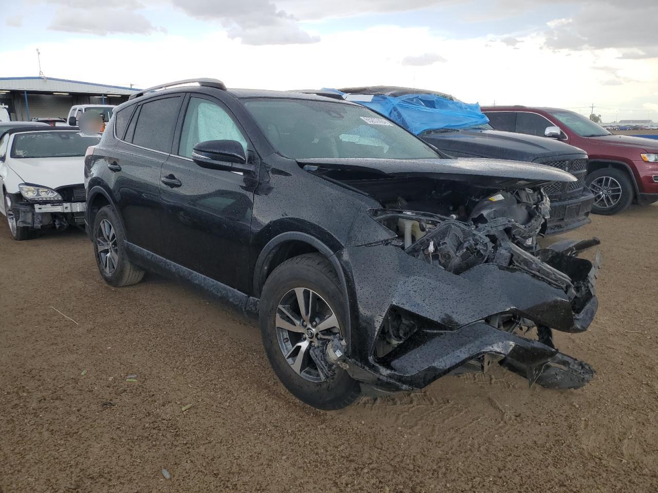 2017 Toyota RAV 4 VIN 2T3RFREV9HW684794 Copart auction photo, front end damage thumbnail 4