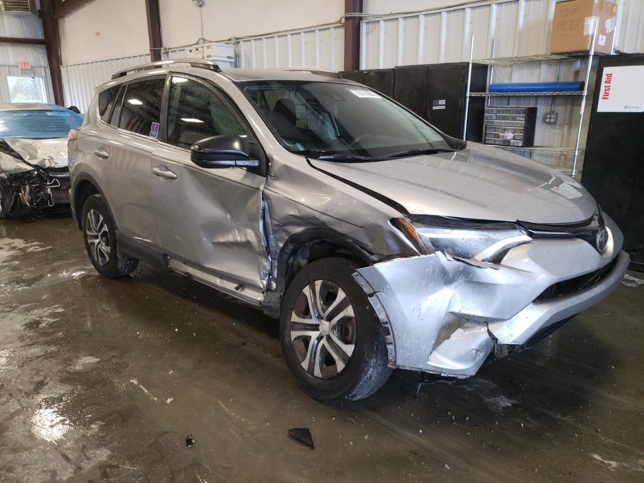 2017 Toyota RAV 4 VIN 2T3ZFREV5HW329251 Copart auction photo, side / front end damage thumbnail 4