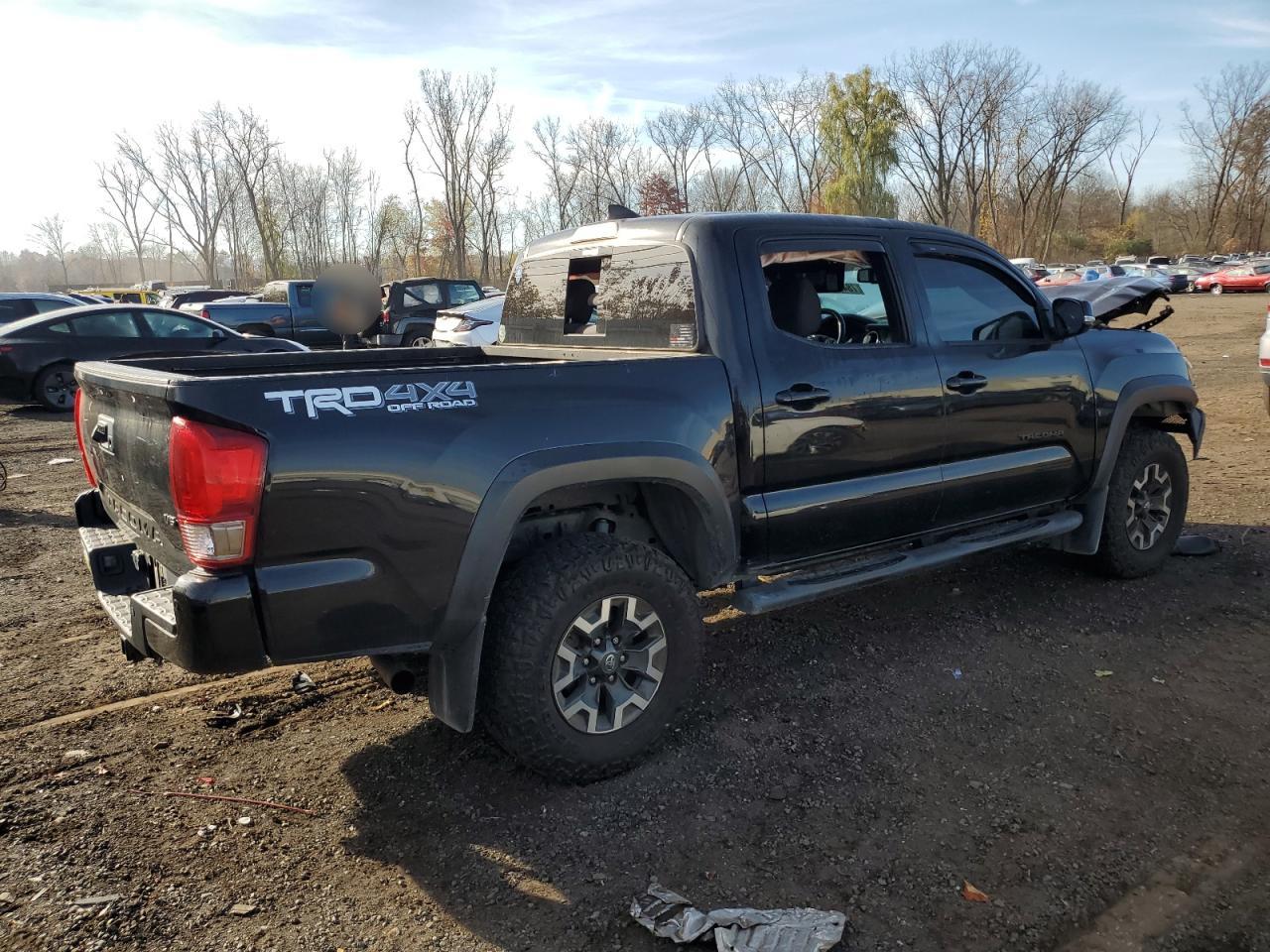 2017 Toyota Tacoma VIN 3TMCZ5AN4HM110634 Copart auction photo, front end / minor dent/scratches damage thumbnail 3