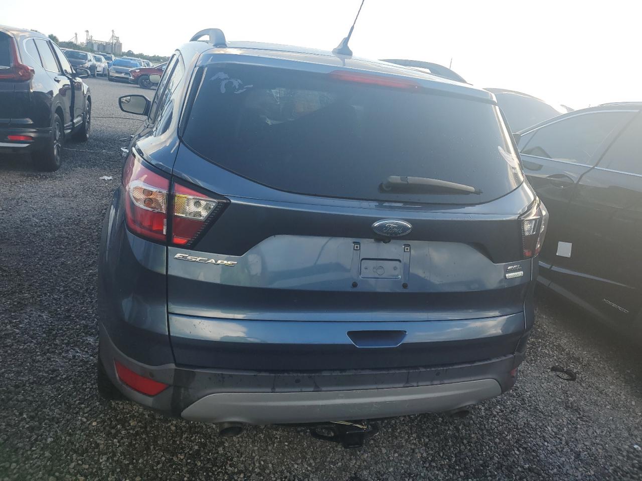 2018 Ford Escape VIN 1FMCU0HD6JUB97741 Copart auction photo, water/flood damage thumbnail 6
