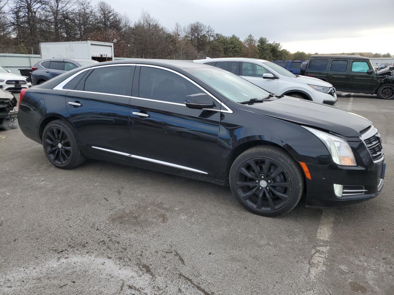 2017 Cadillac XTS VIN 2G61M5S38H9165134 Copart auction photo, front end / minor dent/scratches damage thumbnail 4