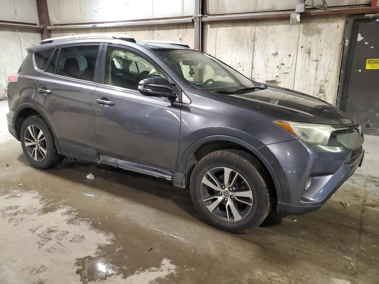 2016 Toyota RAV 4 VIN JTMRFREV5GD195384 Copart auction photo, all over / undercarriage damage thumbnail 4