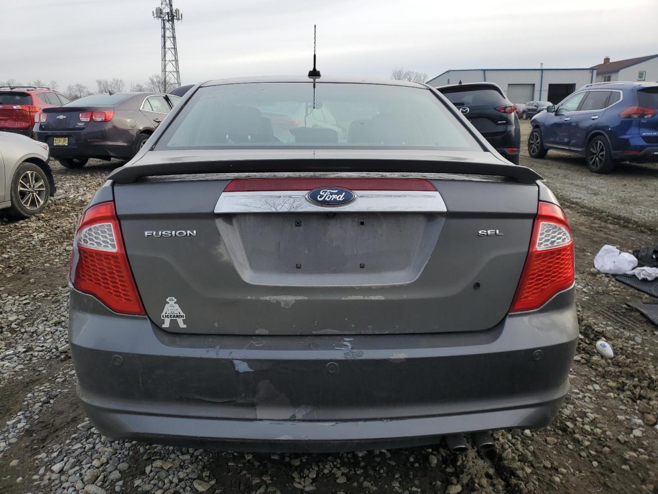 2012 Ford Fusion VIN 3FAHP0JA3CR387188 Copart auction photo, side / front end damage thumbnail 6