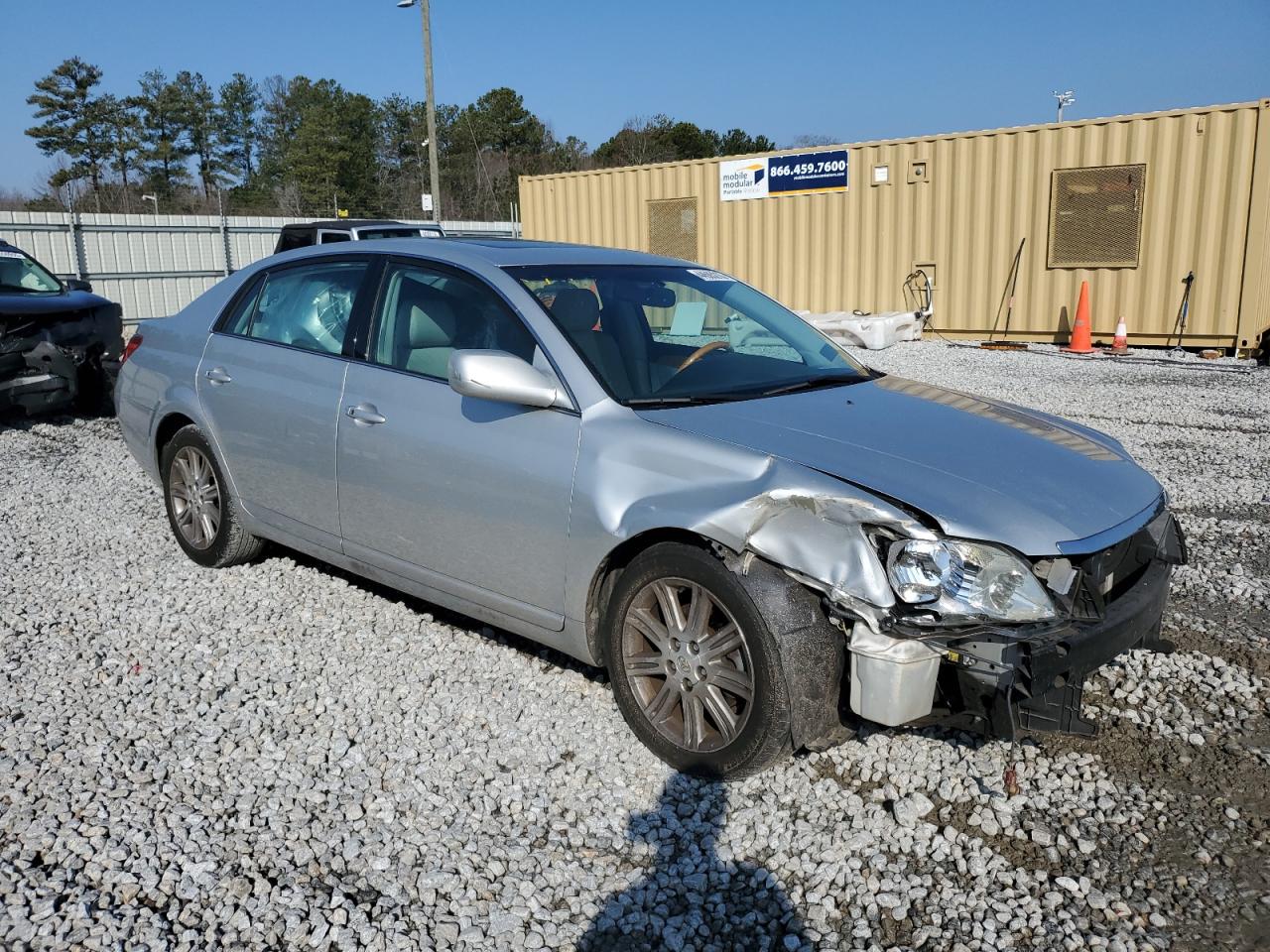 2005 Toyota Avalon VIN 4T1BK36B85U052999 Copart auction photo, side / front end damage thumbnail 4