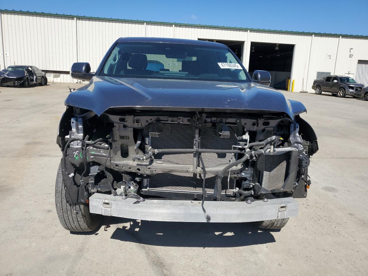 2023 Toyota Tundra VIN 5TFJA5ABXPX021227 Copart auction photo, front end damage thumbnail 5