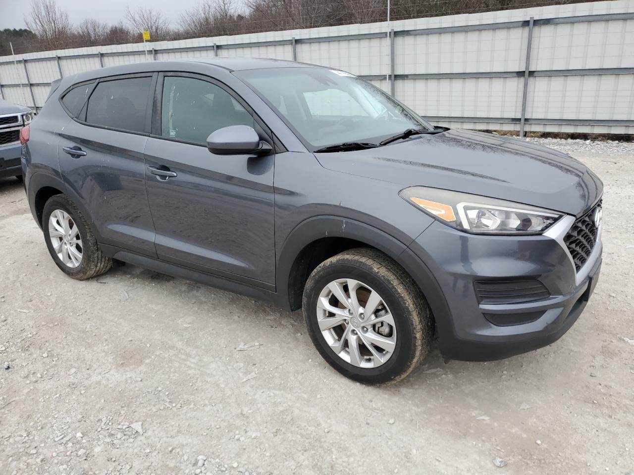 2019 Hyundai Tucson VIN KM8J23A47KU885323 Copart auction photo, side / rear end damage thumbnail 4