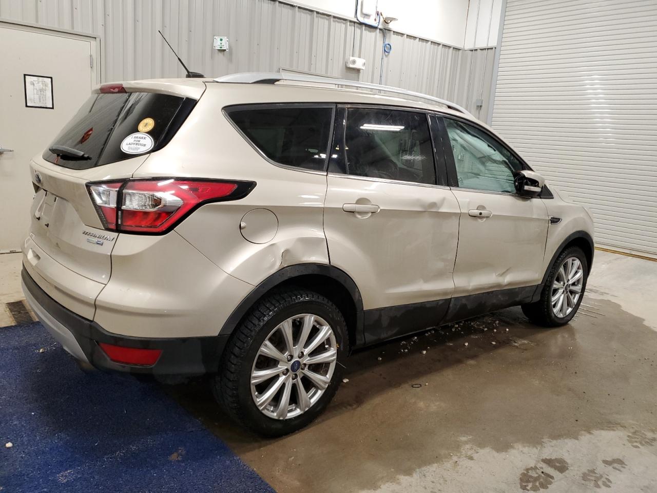 2017 Ford Escape VIN 1FMCU9JD1HUC87663 Copart auction photo, rollover damage thumbnail 3