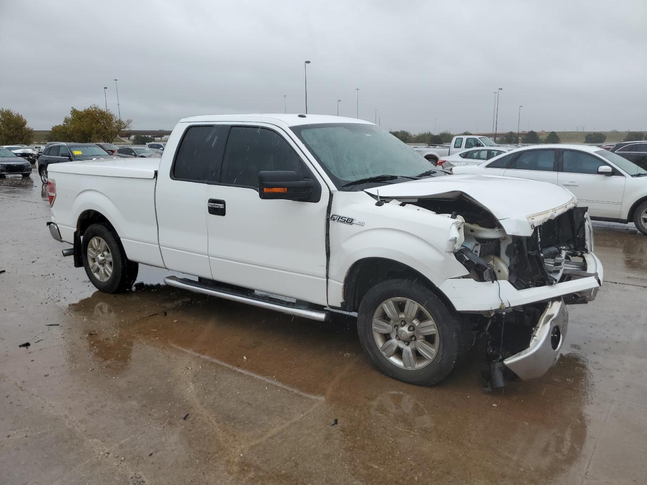 2011 Ford F-150 VIN 1FTEX1CM0BFB55895 Copart auction photo, front end / minor dent/scratches damage thumbnail 4