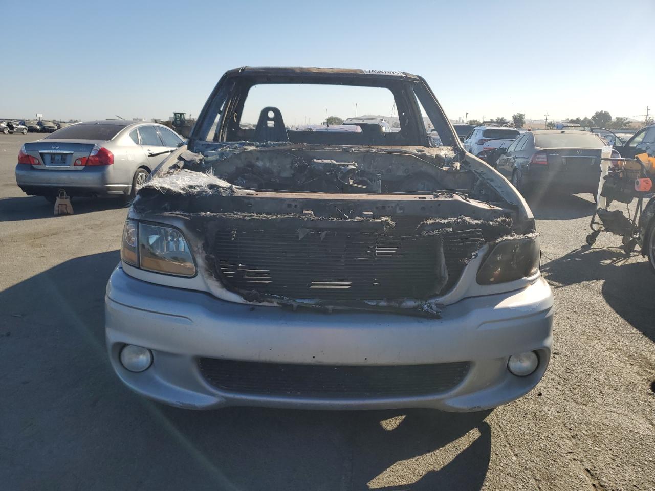 2001 Ford F-150 VIN 2FTZF07341CA90107 Copart auction photo, burn / all over damage thumbnail 5