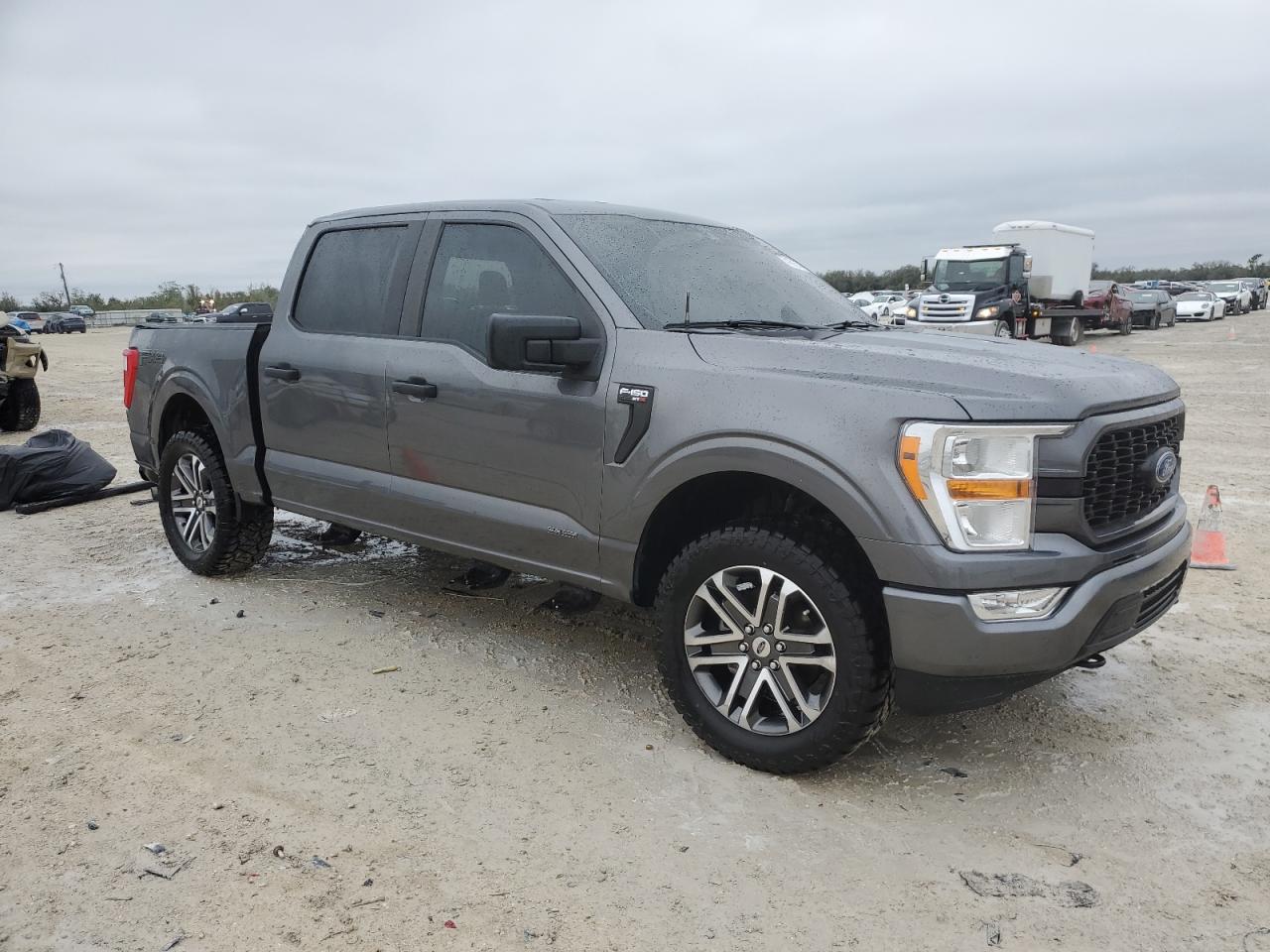 2022 Ford F-150 VIN 1FTFW1E54NFA24079 Copart auction photo, rollover damage thumbnail 4