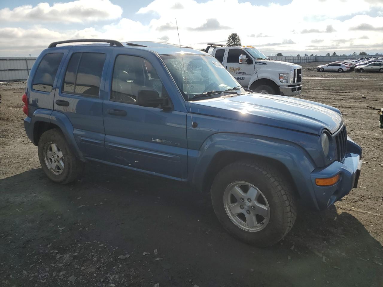 2003 Jeep Liberty (North America) VIN 1J4GL58K43W579448 Copart auction photo, side / undercarriage damage thumbnail 4