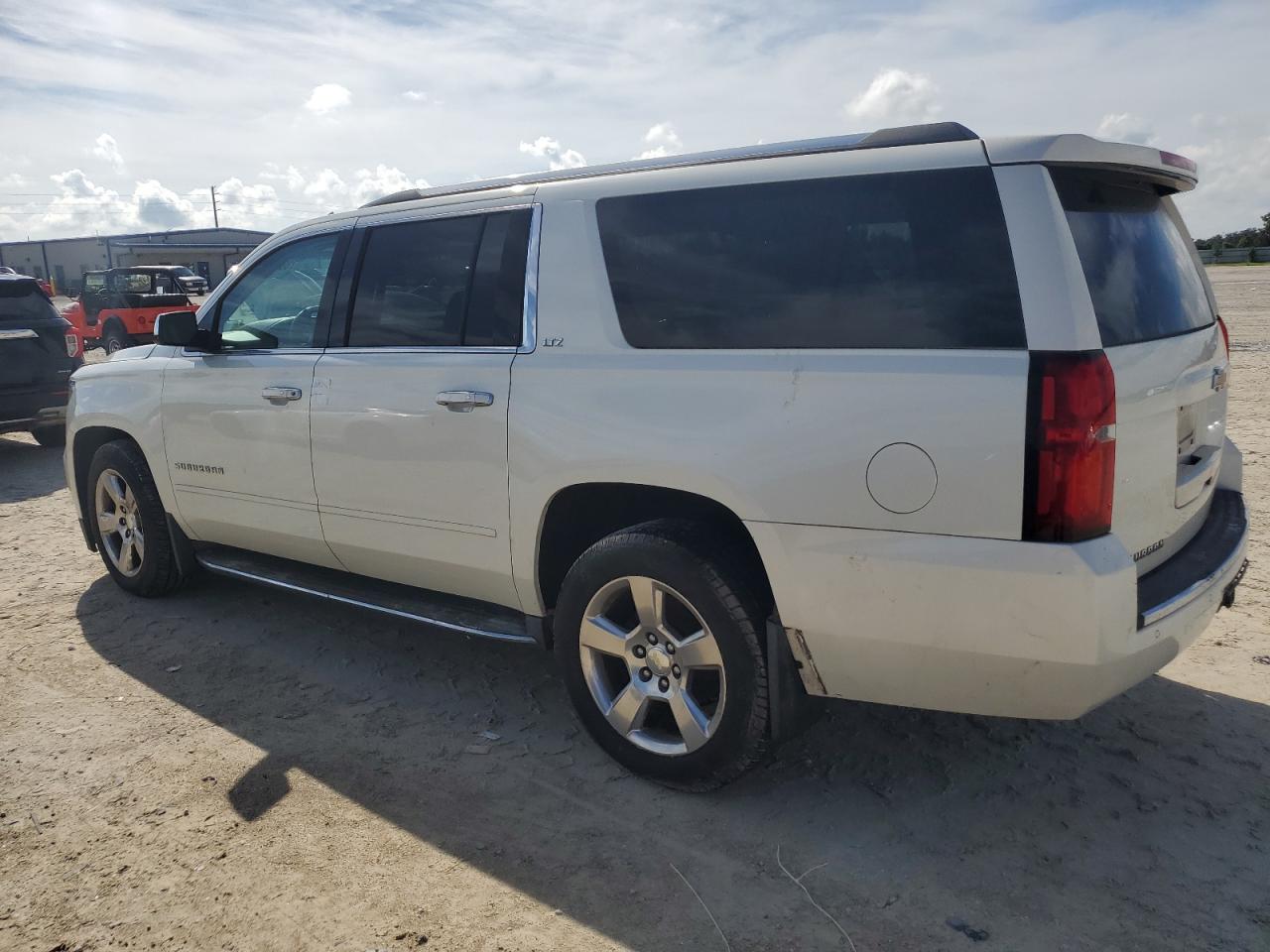 2015 Chevrolet Suburban VIN 1GNSKKKC9FR123636 Copart auction photo, water/flood damage thumbnail 2