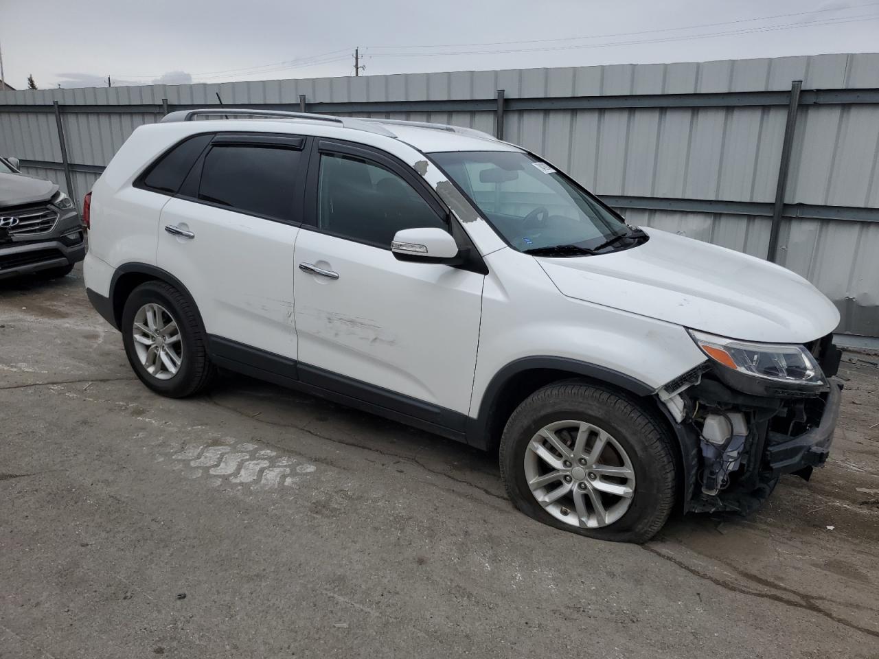 2014 KIA Sorento VIN 5XYKT3A62EG509769 Copart auction photo, front end / side damage thumbnail 4