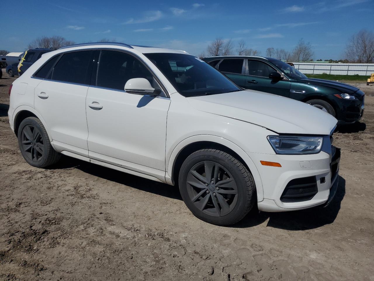 2017 Audi Q3 VIN WA1HCCFS1HR017234 Copart auction photo, front end / minor dent/scratches damage thumbnail 4