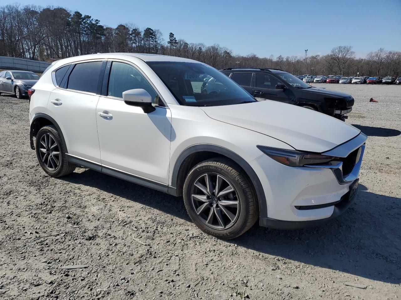 2018 Mazda CX-5 VIN JM3KFADM4J1350115 Copart auction photo, rear end / minor dent/scratches damage thumbnail 4