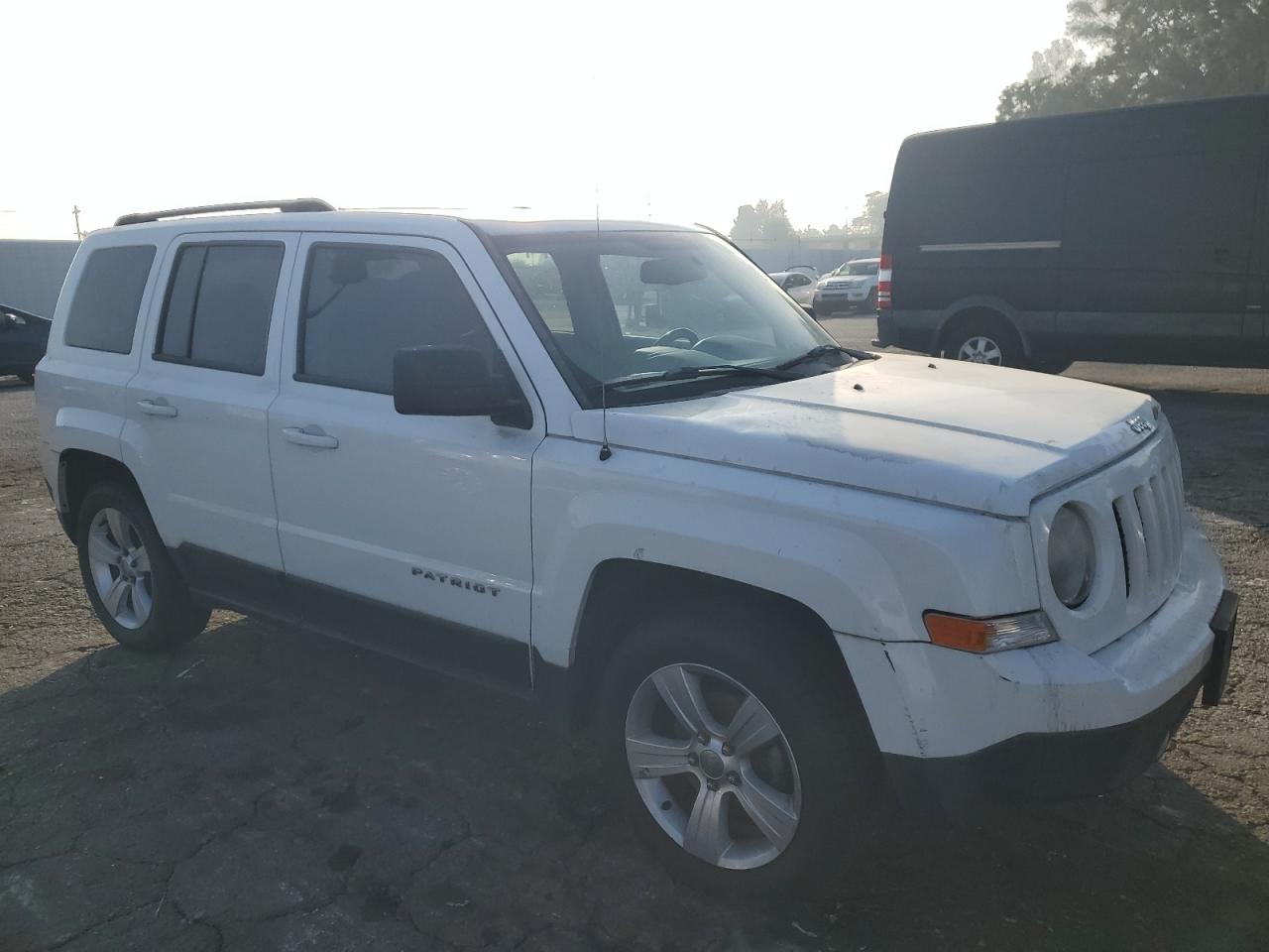 2014 Jeep Liberty (Patriot) VIN 1C4NJPFA9ED564306 Copart auction photo, minor dent/scratches damage thumbnail 4