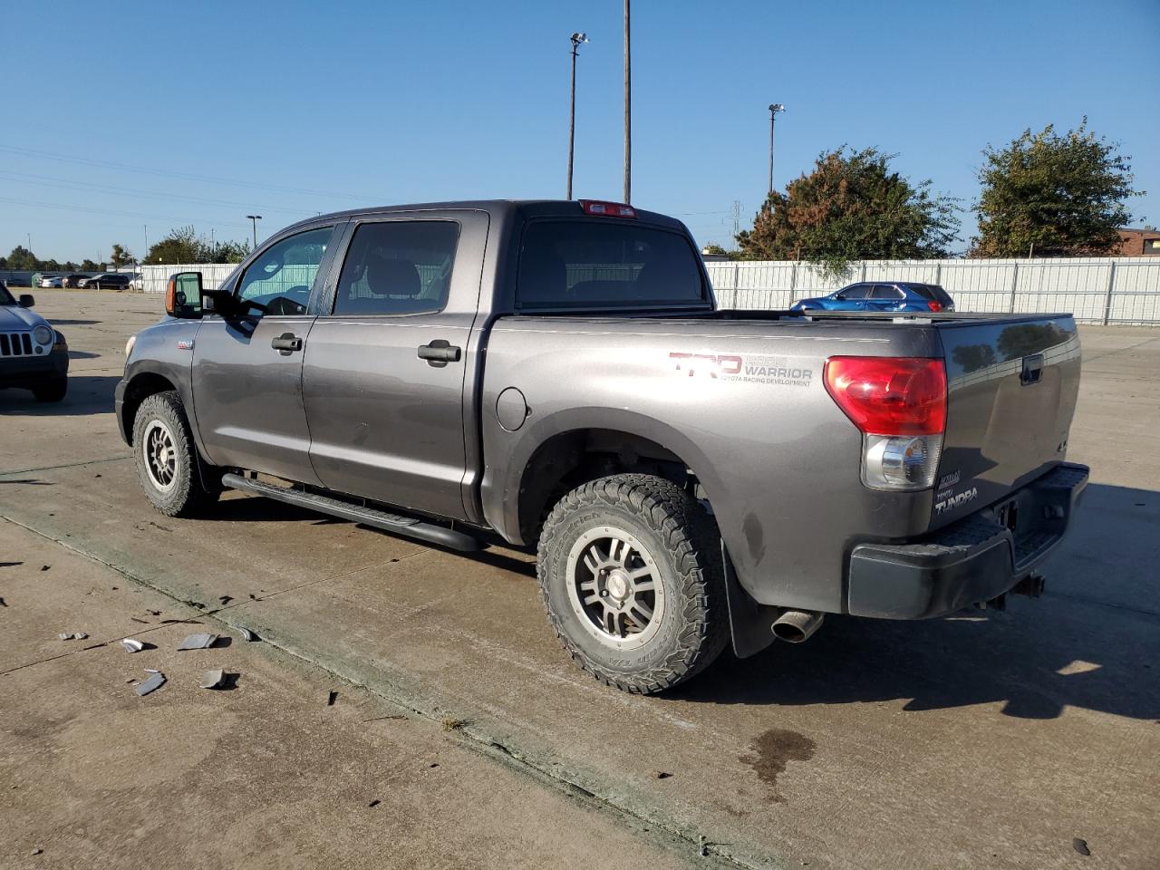 2012 Toyota Tundra VIN 5TFDW5F10CX233367 Copart auction photo, hail / minor dent/scratches damage thumbnail 2