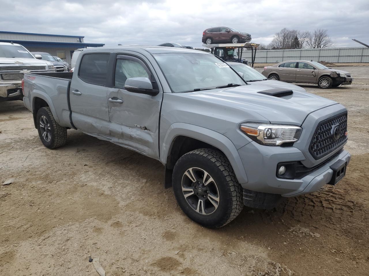 2019 Toyota Tacoma VIN 3TMDZ5BN5KM058358 Copart auction photo, side damage thumbnail 4