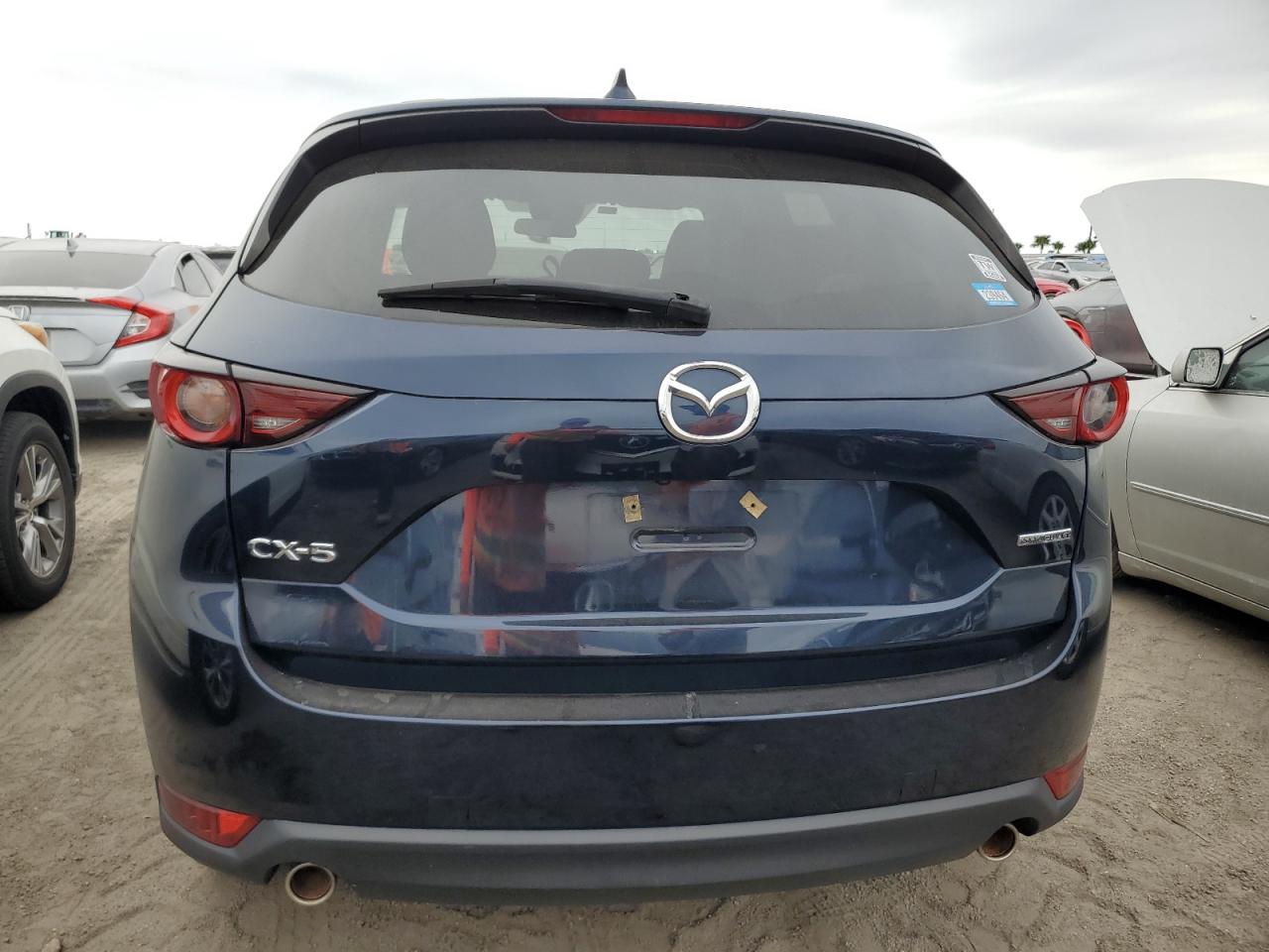 2021 Mazda CX-5 VIN JM3KFACM9M1380958 Copart auction photo, water/flood damage thumbnail 11