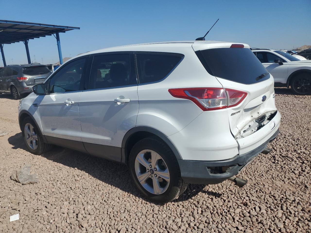 2015 Ford Escape VIN 1FMCU9G95FUB82219 Copart auction photo, rear end damage thumbnail 2