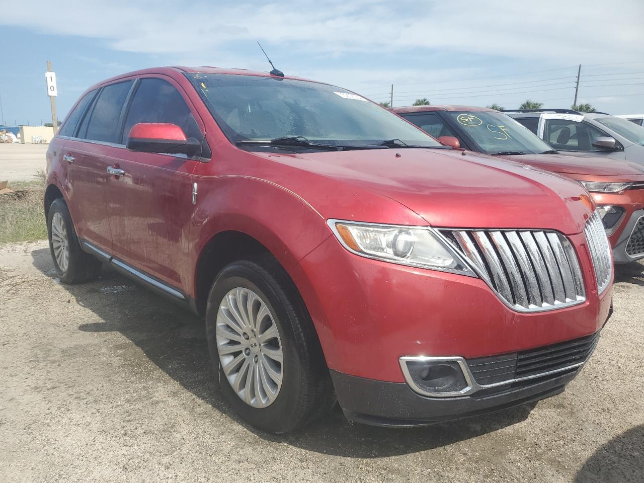 2012 Lincoln MKX VIN 2LMDJ6JKXCBL10614 Copart auction photo, water/flood damage thumbnail 4
