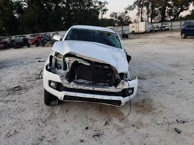 2017 Toyota Tacoma VIN 3TMDZ5BN4HM020094 Copart auction photo, rollover damage thumbnail 11