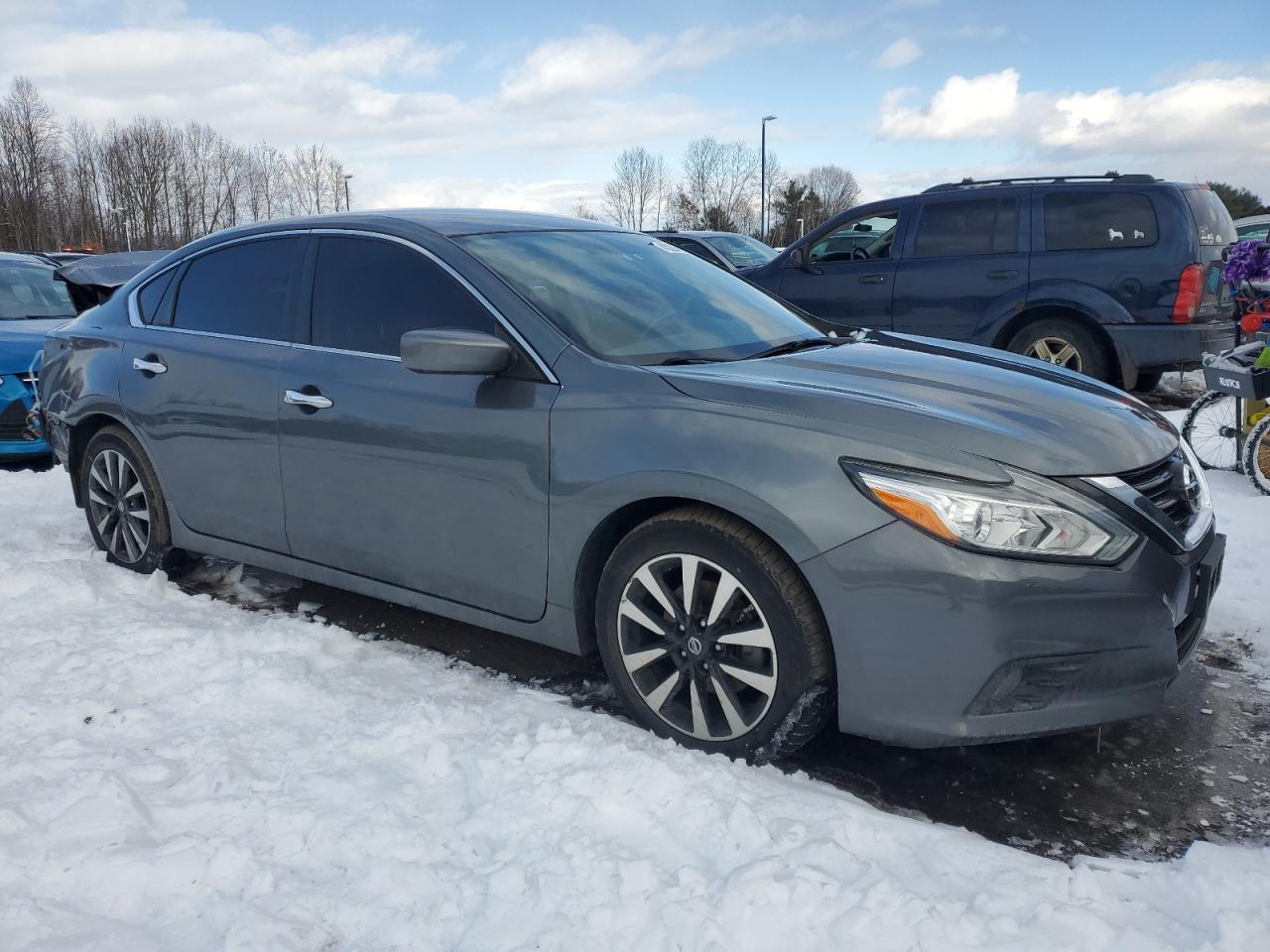 2018 Nissan Altima VIN 1N4AL3AP6JC121274 Copart auction photo, rear end / minor dent/scratches damage thumbnail 4