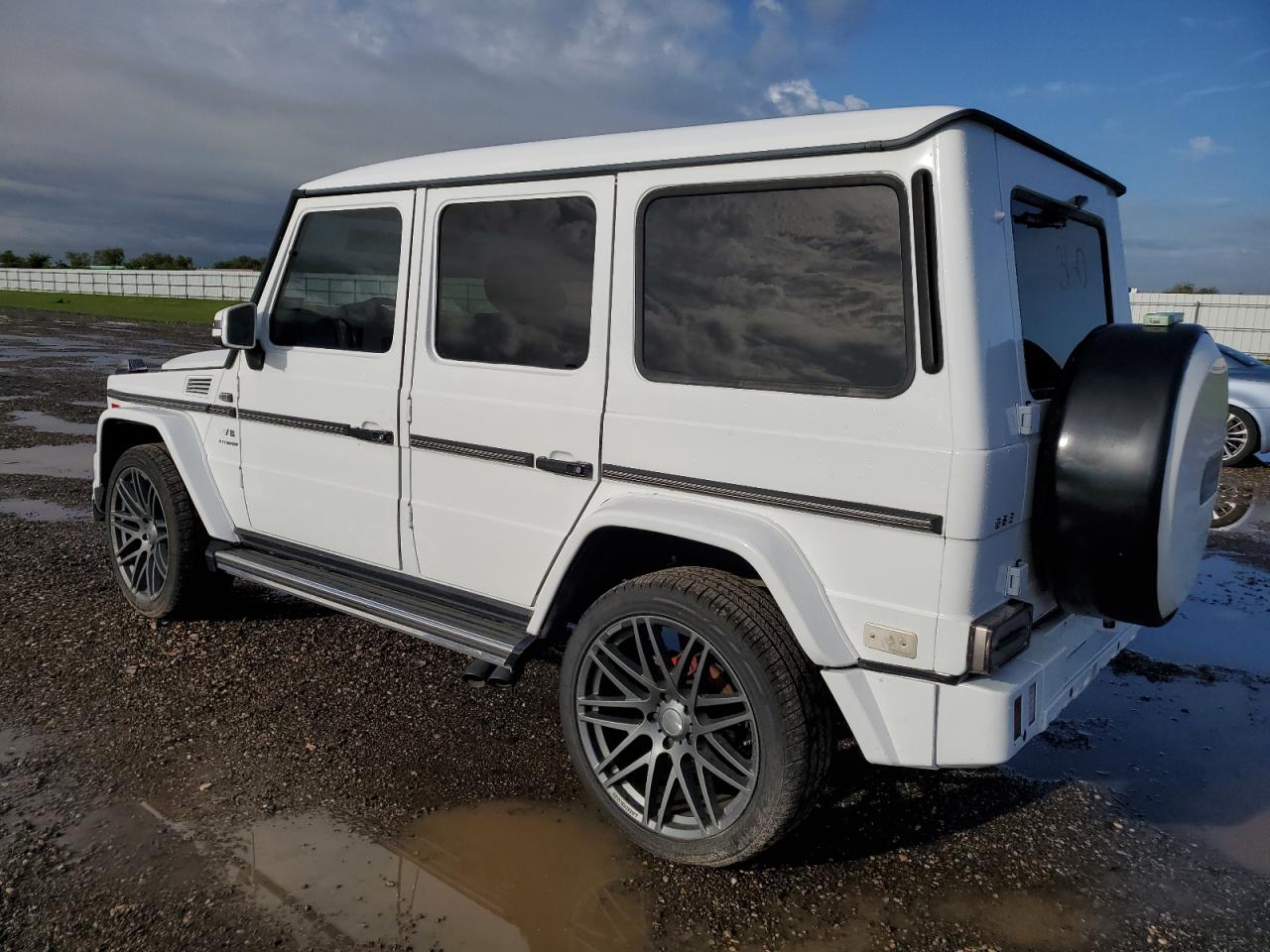 2002 Mercedes-Benz G-klasse VIN WDCYR49E22X132146 Copart auction photo, water/flood damage thumbnail 2