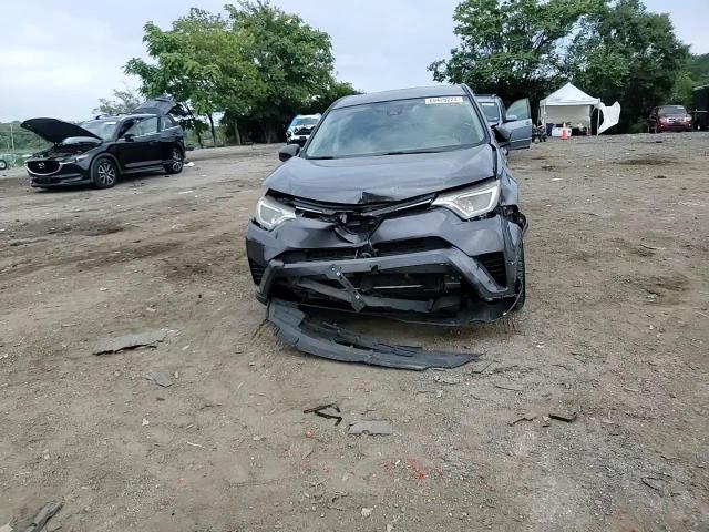 2018 Toyota RAV 4 VIN JTMBFREV1JJ219111 Copart auction photo, front end / minor dent/scratches damage thumbnail 11
