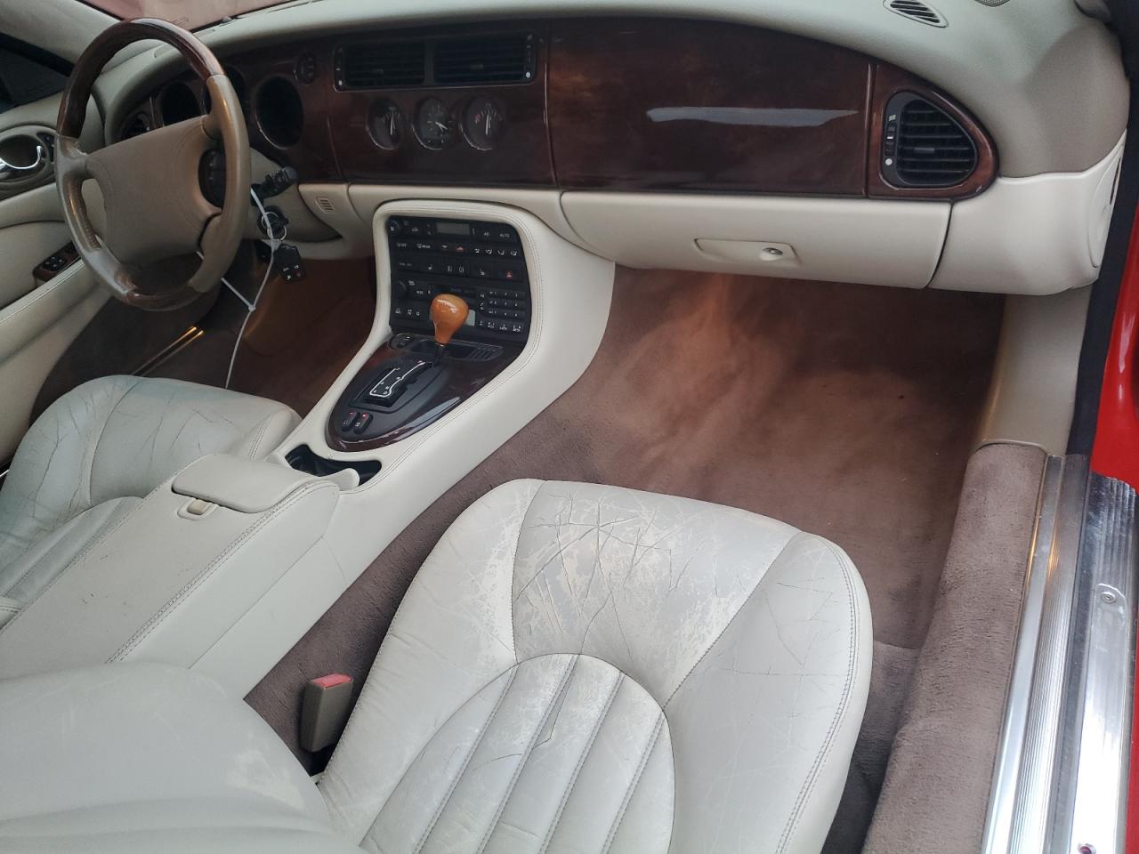 1999 Jaguar XK VIN SAJGX2041XC034578 Copart auction photo, rear end damage thumbnail 8