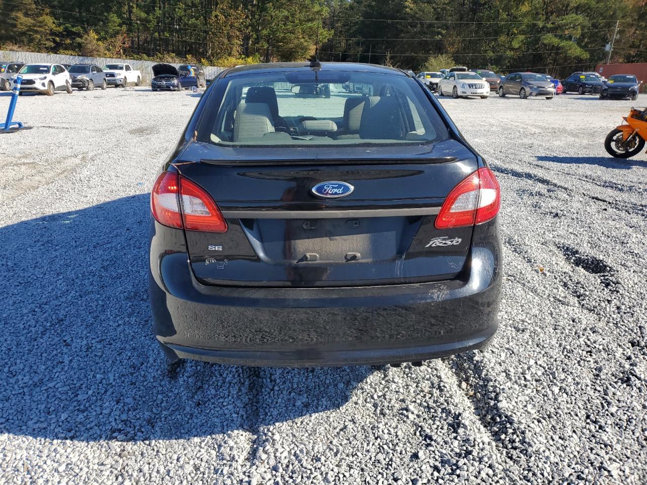 2012 Ford Fiesta VIN 3FADP4BJXCM110667 Copart auction photo, front end damage thumbnail 6