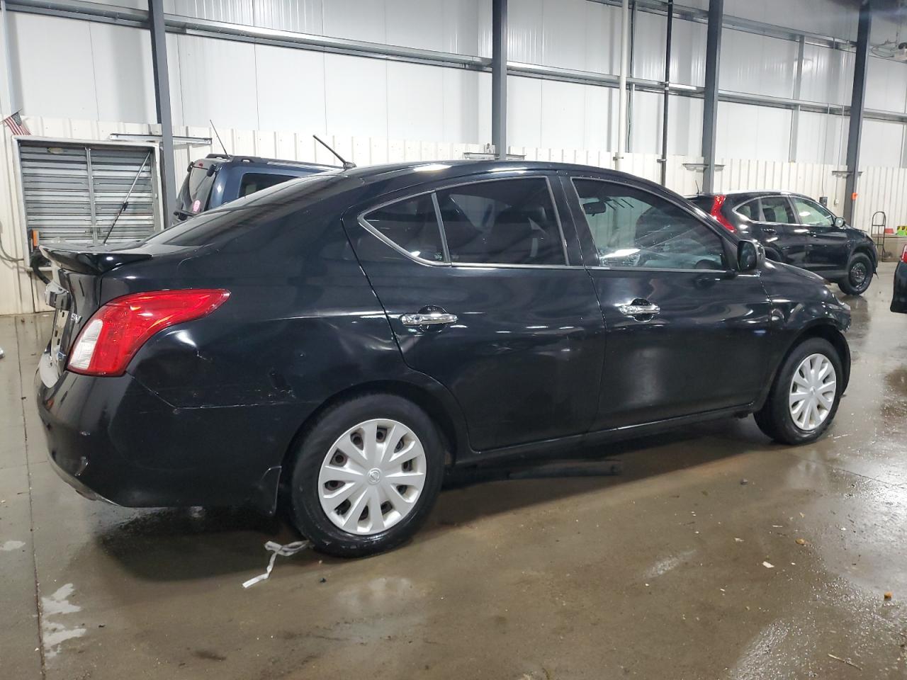 2014 Nissan Versa VIN 3N1CN7APXEL839962 Copart auction photo, front end / hail damage thumbnail 3