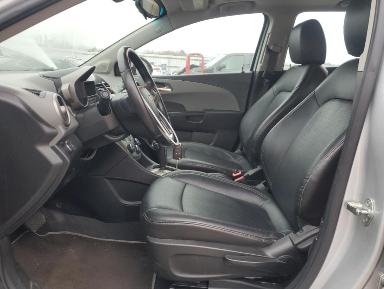 2014 Chevrolet Sonic VIN 1G1JE6SB5E4232027 Copart auction photo, rear end / minor dent/scratches damage thumbnail 7