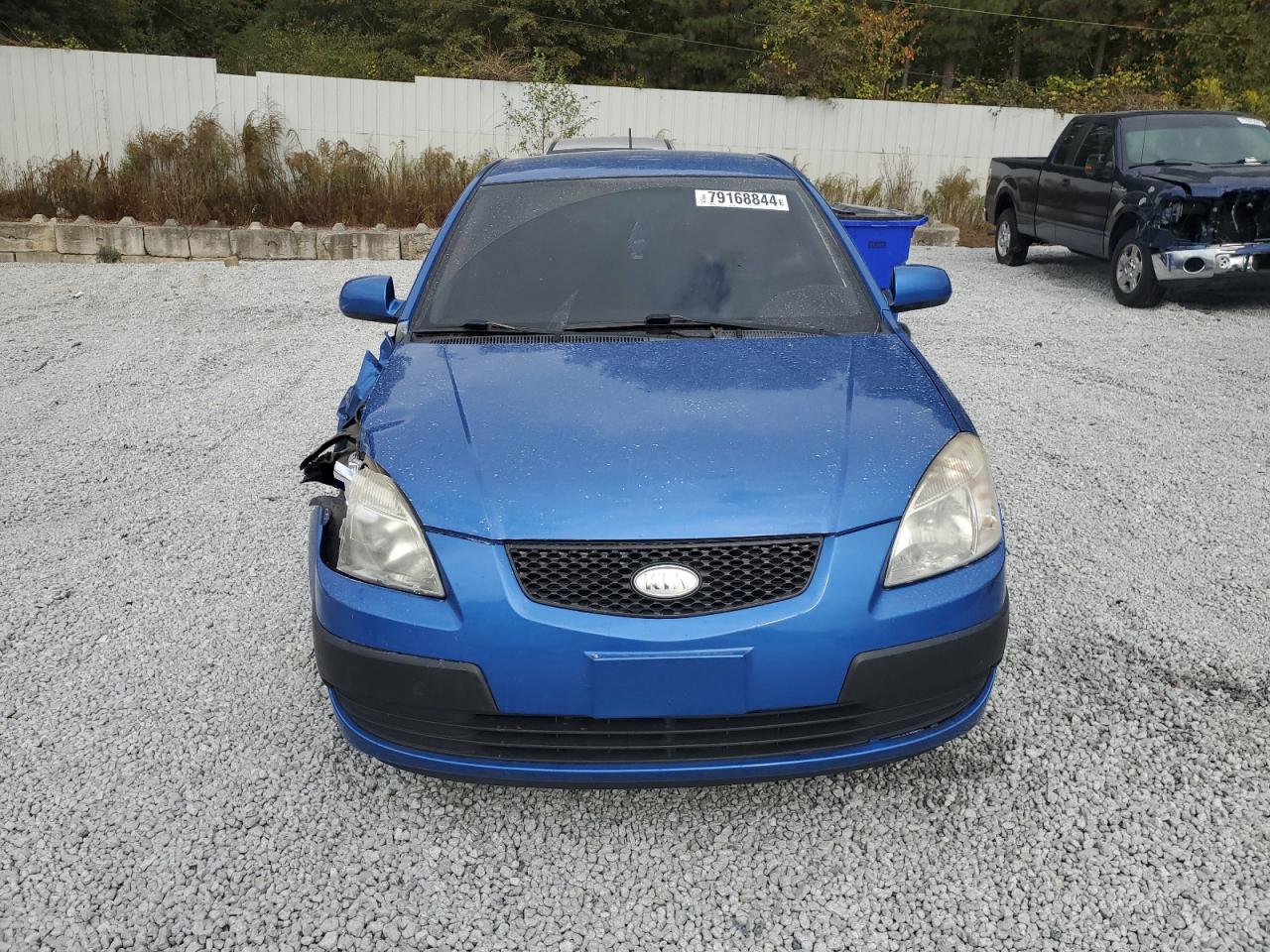 2009 KIA Rio VIN KNADE223196516154 Copart auction photo, front end damage thumbnail 5
