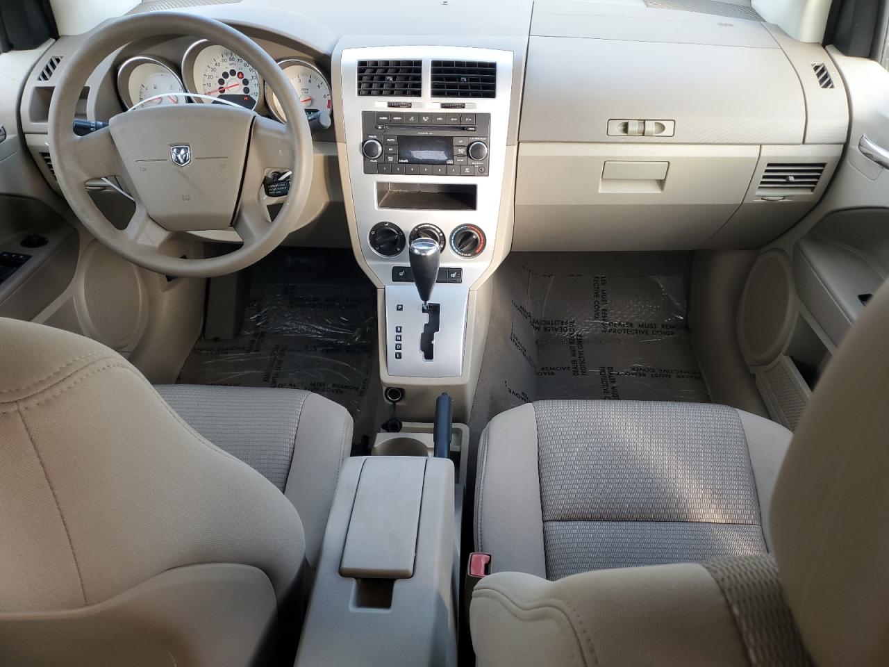 2009 Dodge Caliber VIN 1B3HB48A49D116682 Copart auction photo, front end damage thumbnail 8