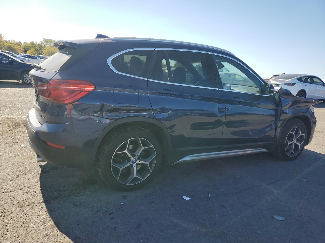 2019 BMW X1 VIN WBXHT3C58K5L37057 Copart auction photo, side / front end damage thumbnail 3
