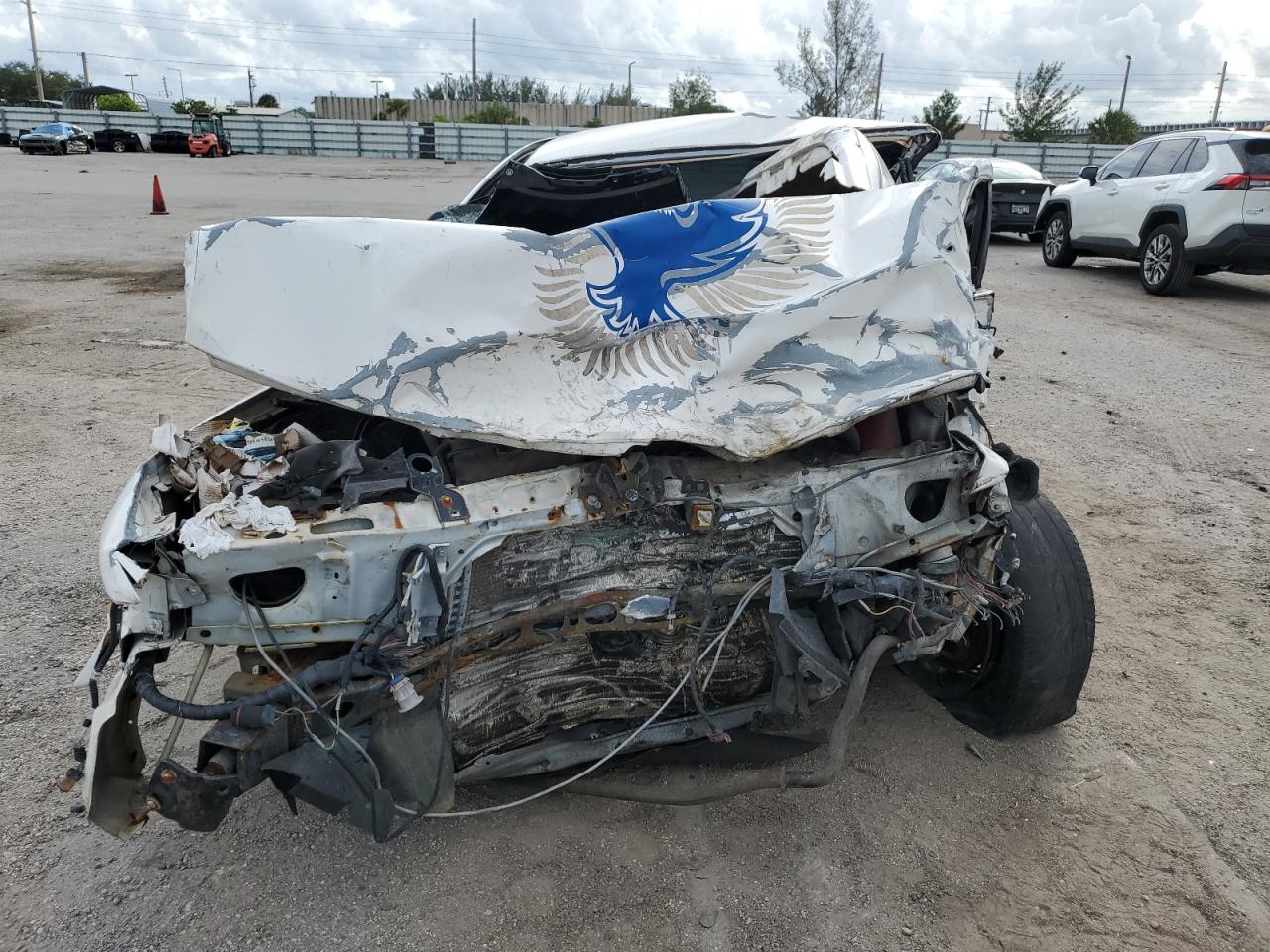 2000 Ford Crown Victoria VIN 2FAFP71W1YX197264 Copart auction photo, all over damage thumbnail 5