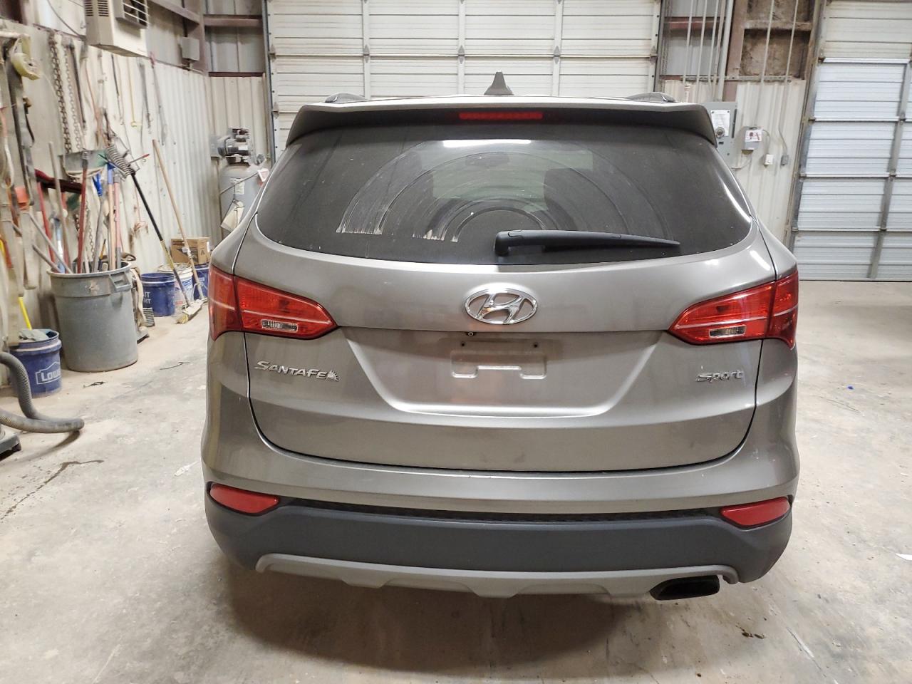 2016 Hyundai Santa Fe VIN 5XYZU3LB1GG340661 Copart auction photo, front end / minor dent/scratches damage thumbnail 6