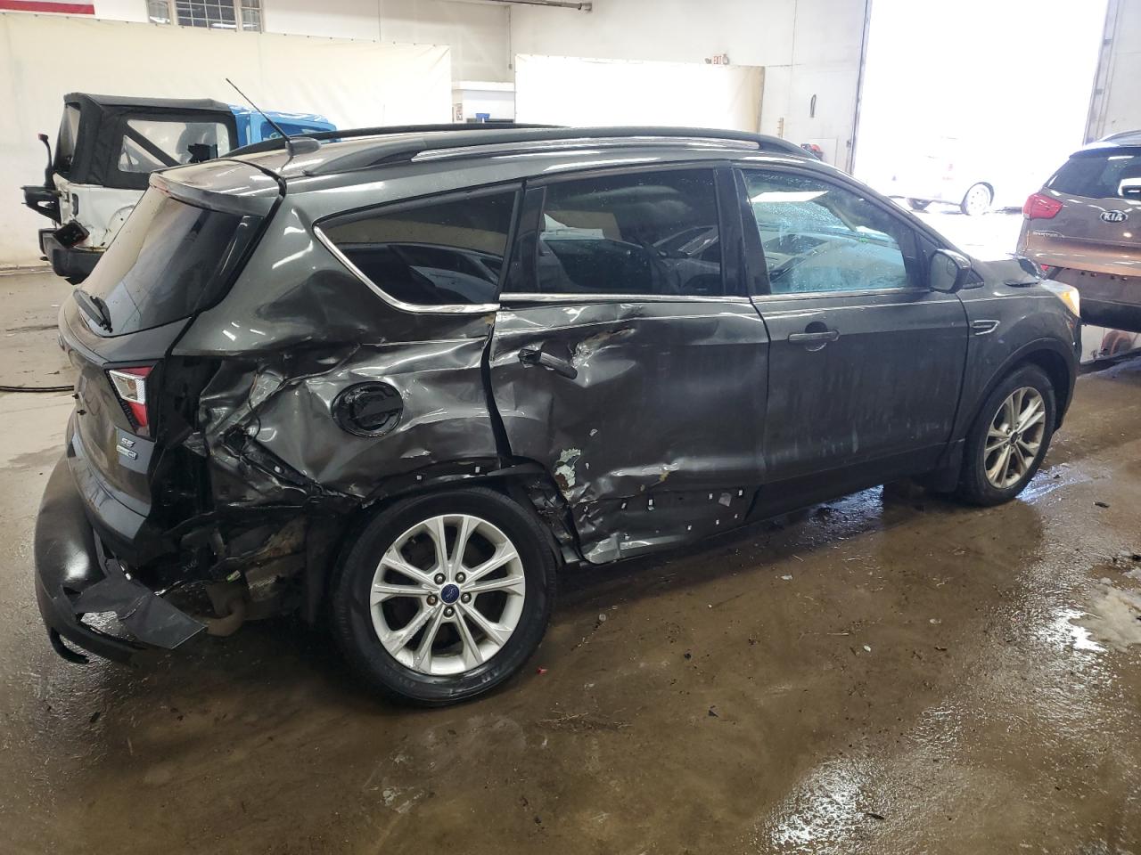 2017 Ford Escape VIN 1FMCU9G93HUA30670 Copart auction photo, all over damage thumbnail 3