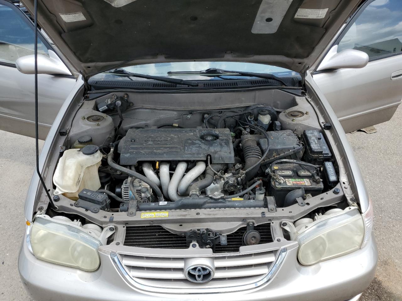 2002 Toyota Corolla VIN 1NXBR12E92Z565173 Copart auction photo, burn - engine damage thumbnail 11